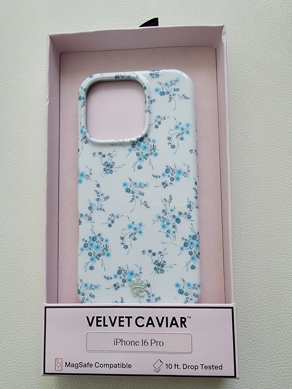 Velvet Caviar White iPhone 16 Pro Case with Blue Floral Print